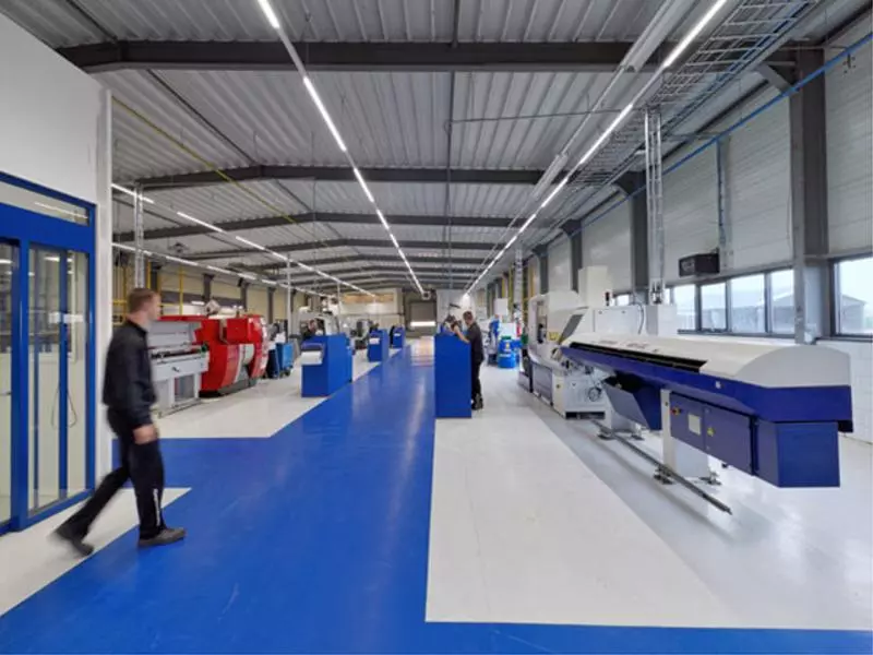 Production hall at Witec with CNC machining and turning equipment for serial manufacturing of precision metal components.webp