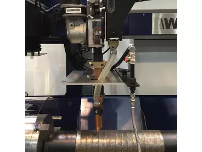 Weldcald machine